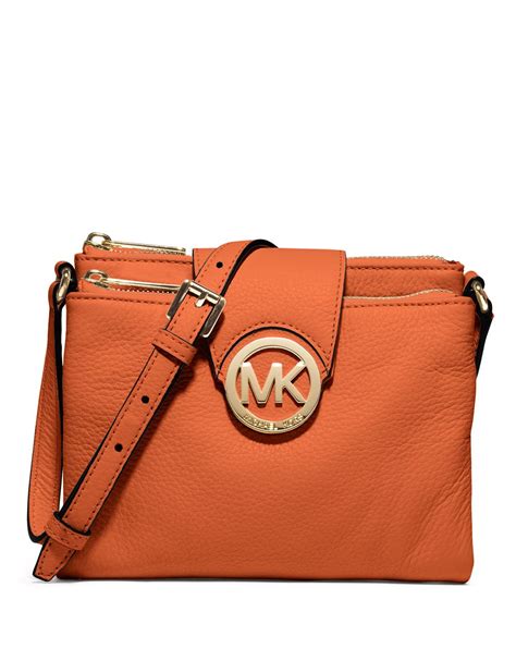 orange michael kors tote|michael kors orange crossbody.